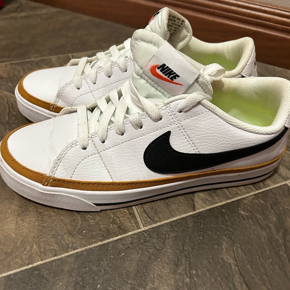Nike Women’s White and Black Sneakers